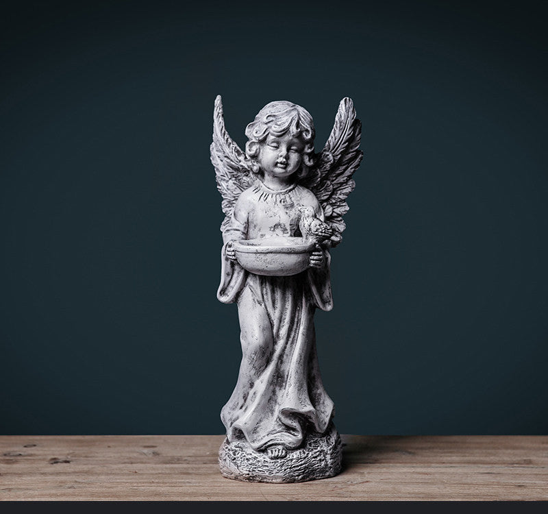 Angel plaster sculpture of creative characters