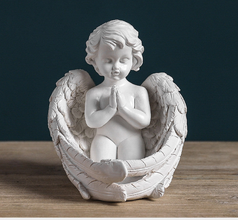 Angel plaster sculpture of creative characters