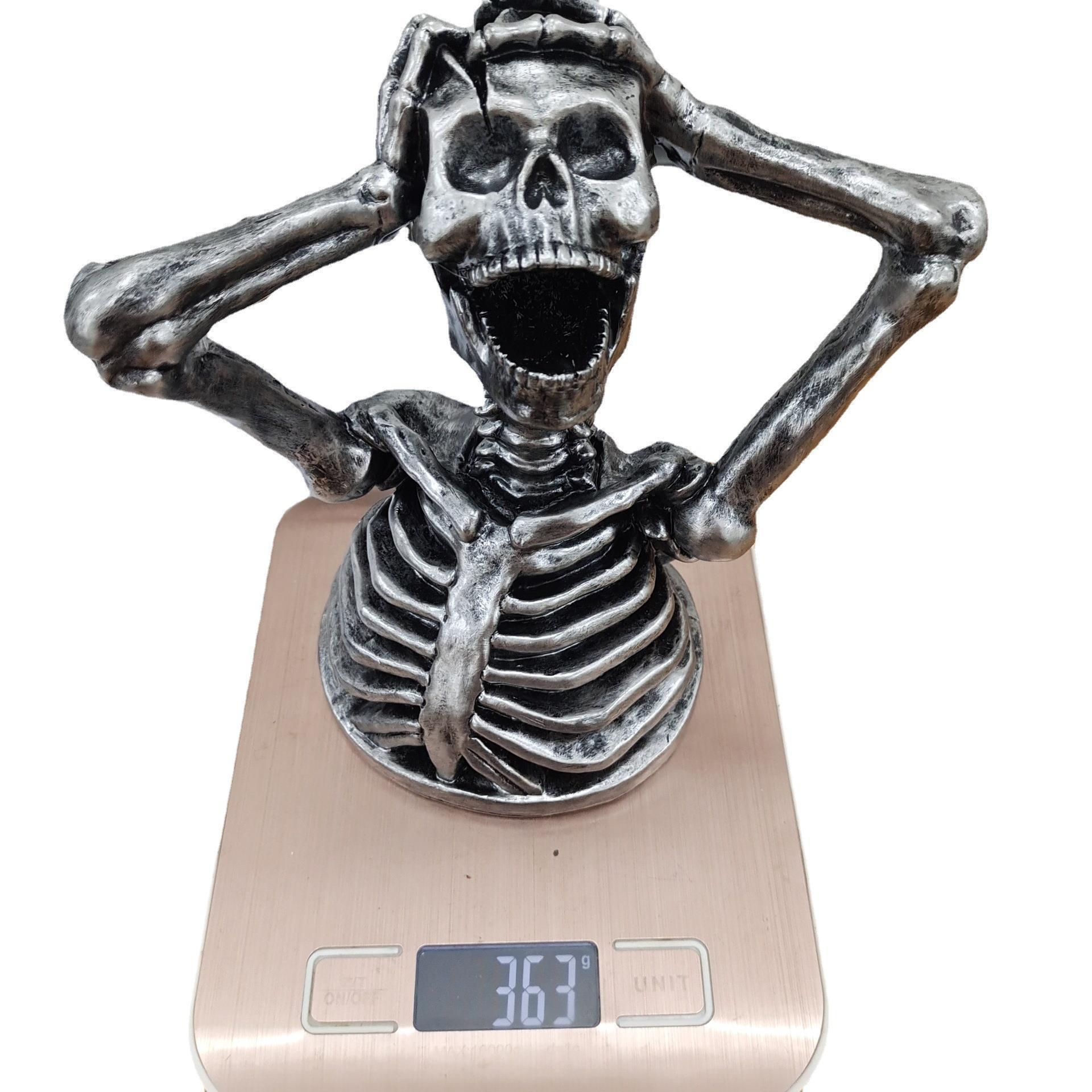 Sculpture Breaks Down Madness Skeleton Bust