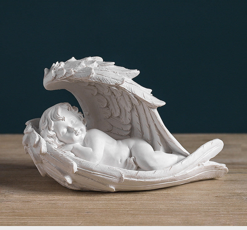 Angel plaster sculpture of creative characters