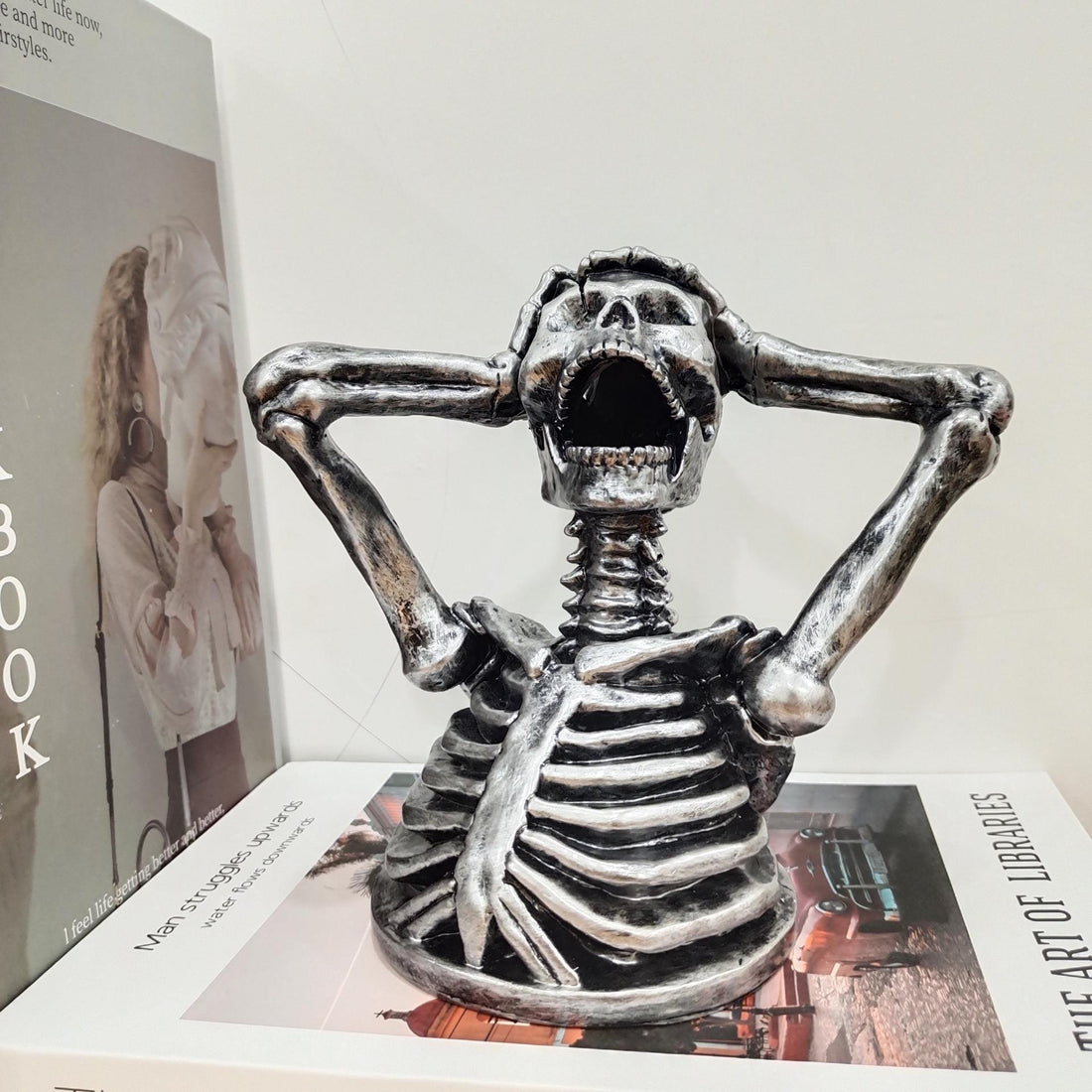 Sculpture Breaks Down Madness Skeleton Bust